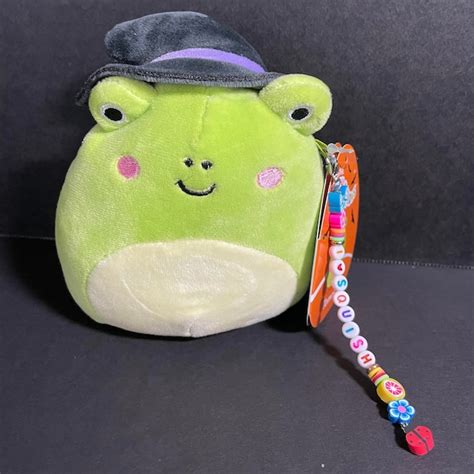Irresistibly soft frog with a witch hat squishmallow